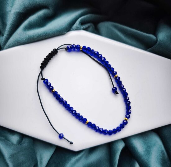 Zila ar zelta krāsas furnitūru aproce 